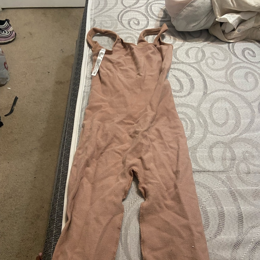 beige full body suit